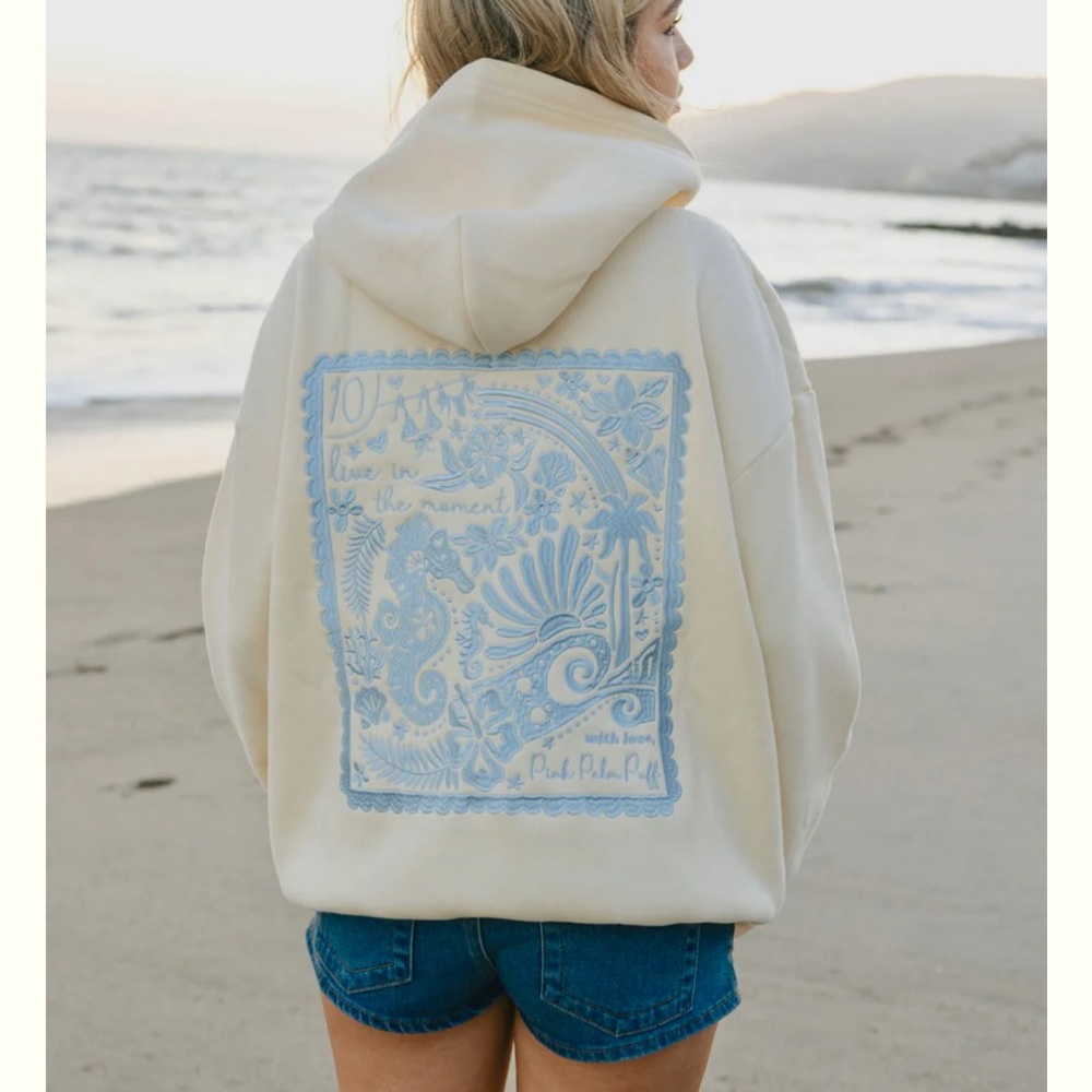 Cream Hoodie with Blue Graphic